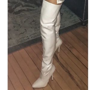 Thigh high white patent boots